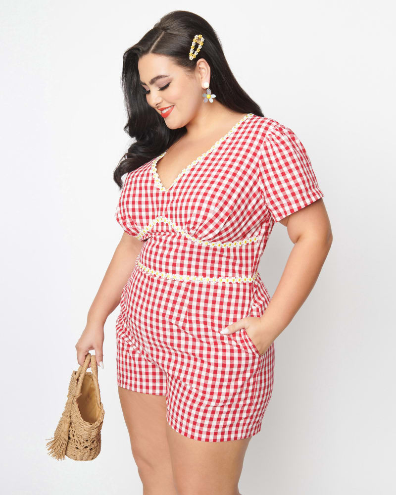 Front of a model wearing a size 5X/26 Unique Vintage Plus Size Red Gingham & Daisy Romper in Red Gingham & Daisy by Unique Vintage. | dia_product_style_image_id:269918